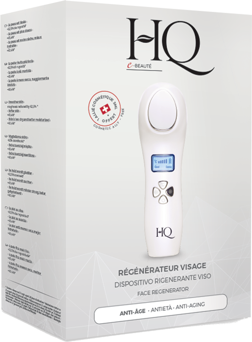 A box with a facial treatment device and product information in multiple languages.