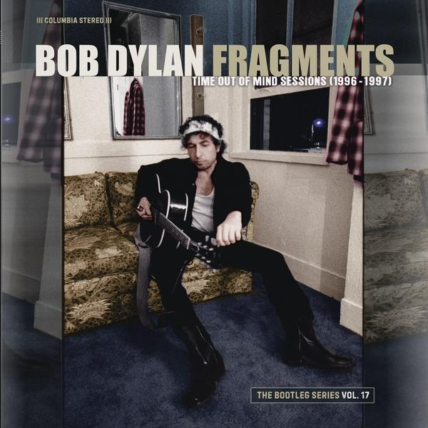 Pochette d'album : Bob Dylan avec une guitare, assis dans une pièce. Titre de l'album : Fragments.