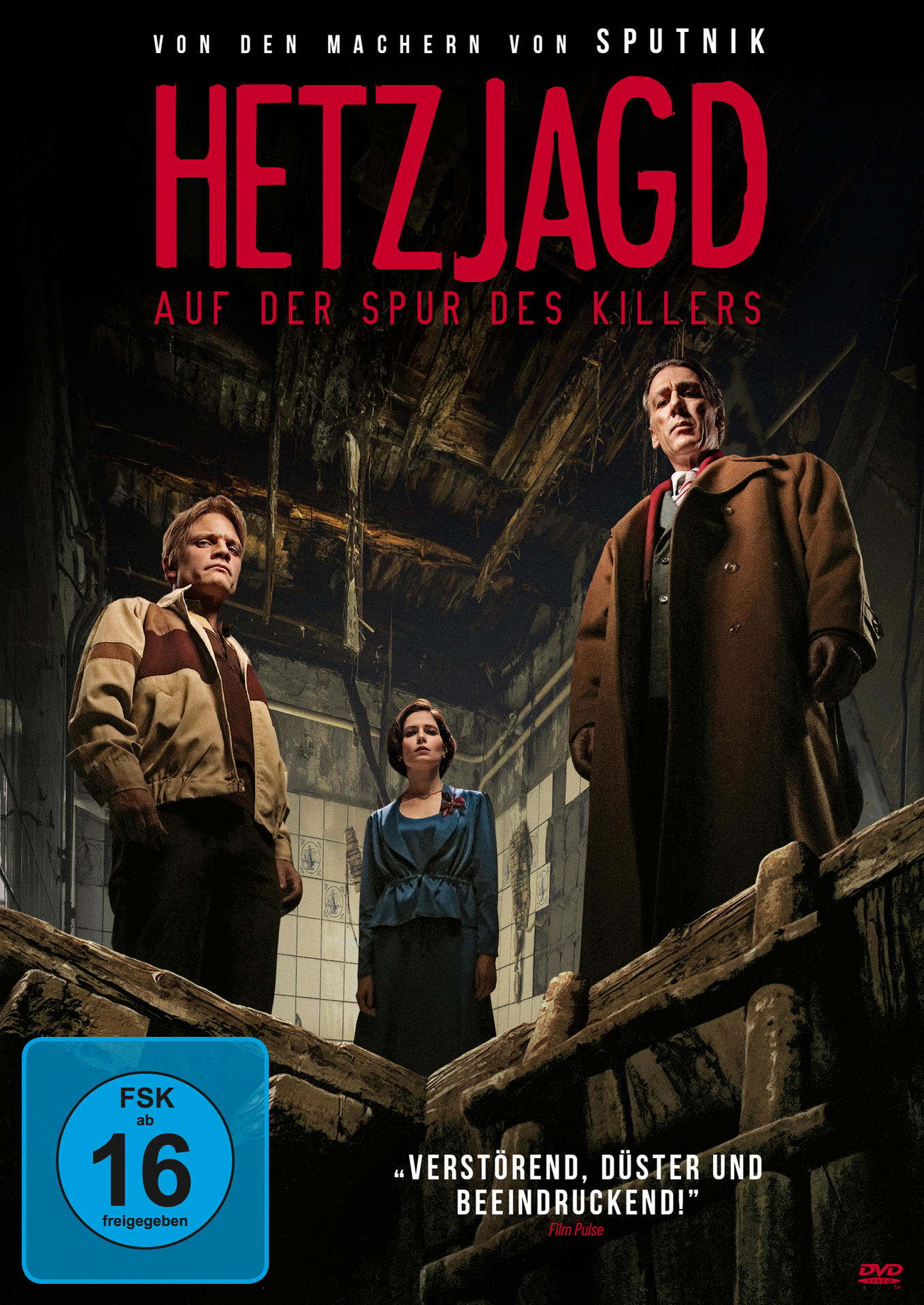 Filmplakat mit drei Personen. Text: HETZJAGD. Ein älterer Mann und zwei jüngere Leute.