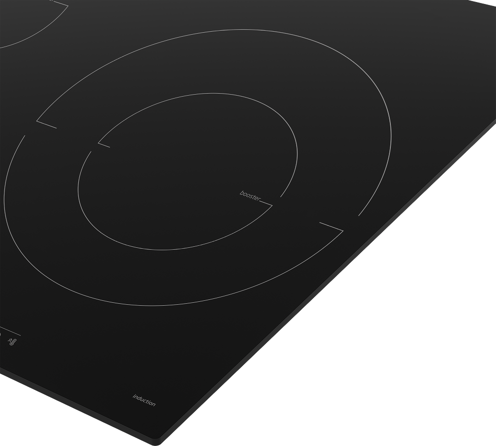 Primer plano de una placa de inducción negra. La placa tiene zonas de inducción circulares.