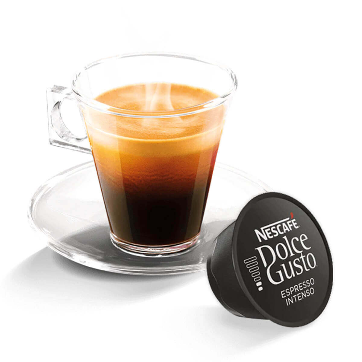 Una taza de vidrio con café y una cápsula negra Dolce Gusto.