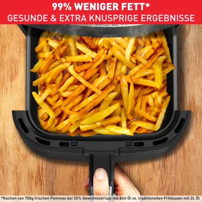 Eine Heißluftfritteuse mit Pommes. Text: 99 % weniger Fett. Gesunde & extra knusprige Ergebnisse.