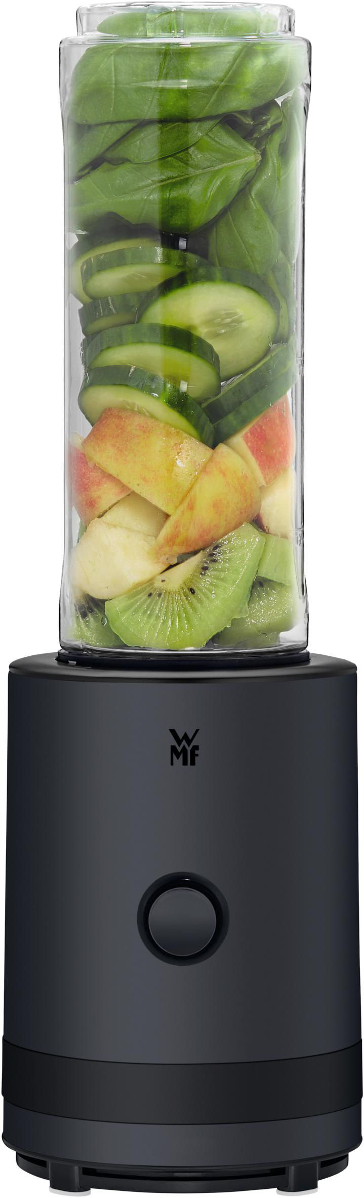 Ein schwarzer Mixer mit einem transparenten Behälter, der mit Obst und Gemüse gefüllt ist.