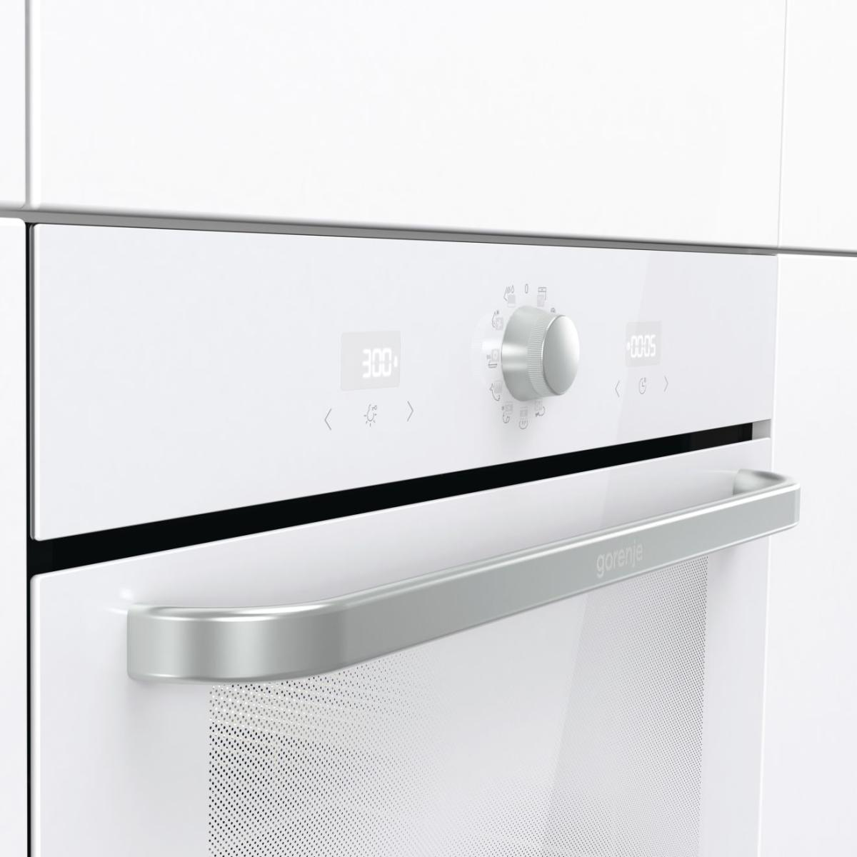 Fehér sütő vezérlőpanel digitális kijelzővel, fogantyúval és gombbal. Gorenje logó látható.