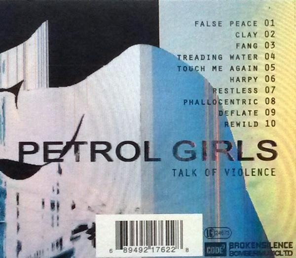 Albumcover. Rückseite mit Titelliste. Blau-weißes Farbschema. Petrol Girls Text.