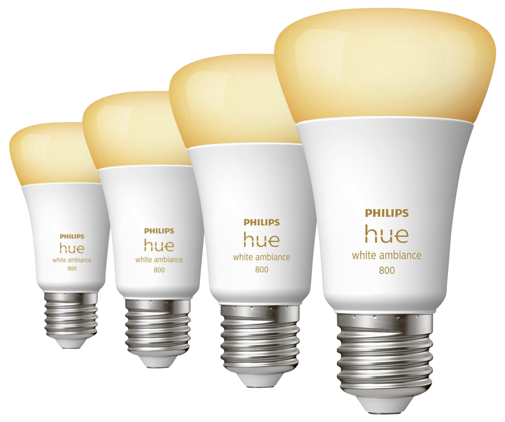 Vier weiße Philips Hue Smart-Glühbirnen in einer Reihe angeordnet, gelbes Licht strahlt aus ihnen aus.