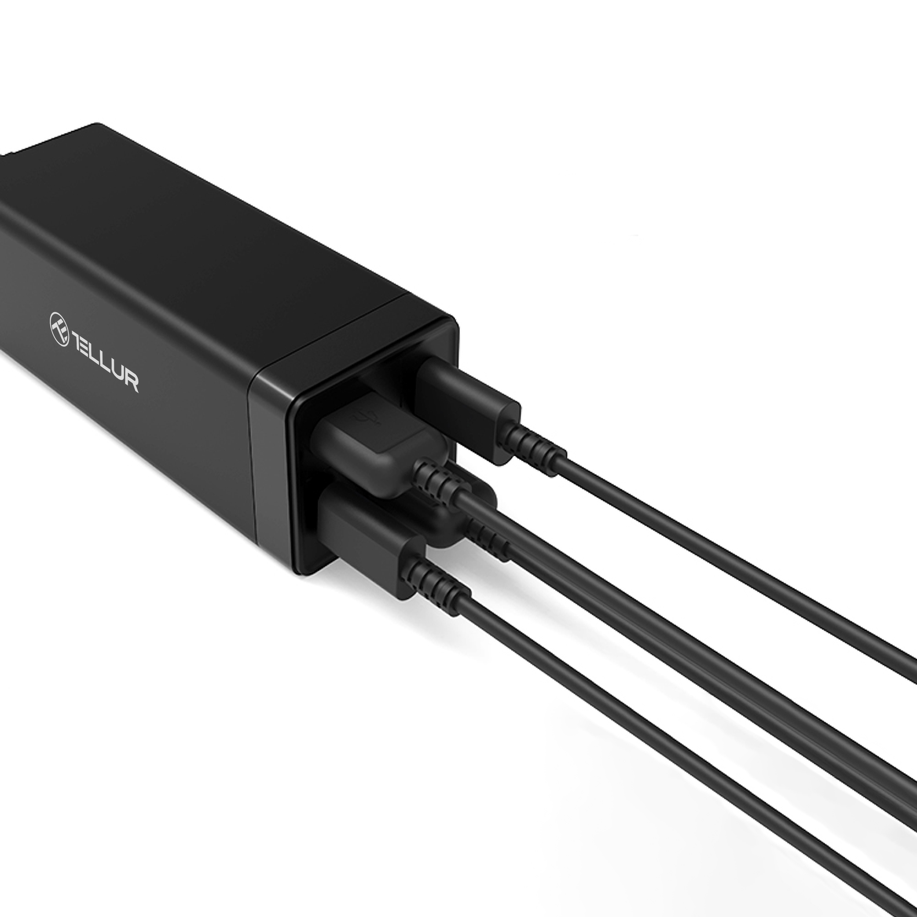 Czarny blok ładujący z trzema dołączonymi kablami ładującymi.