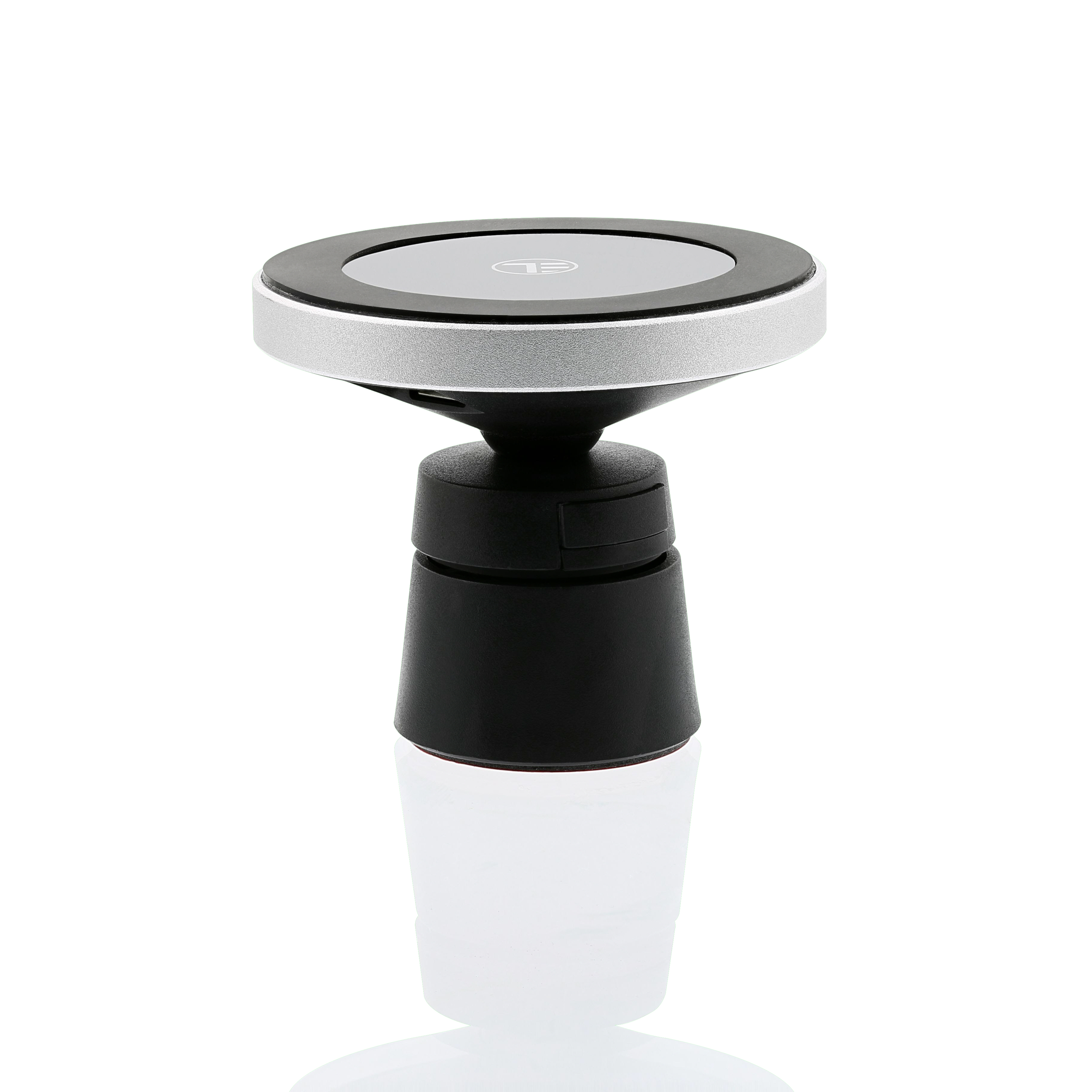 Czarny i srebrny uchwyt do telefonu samochodowego. Jest to okrągły uchwyt na czarnej podstawie.