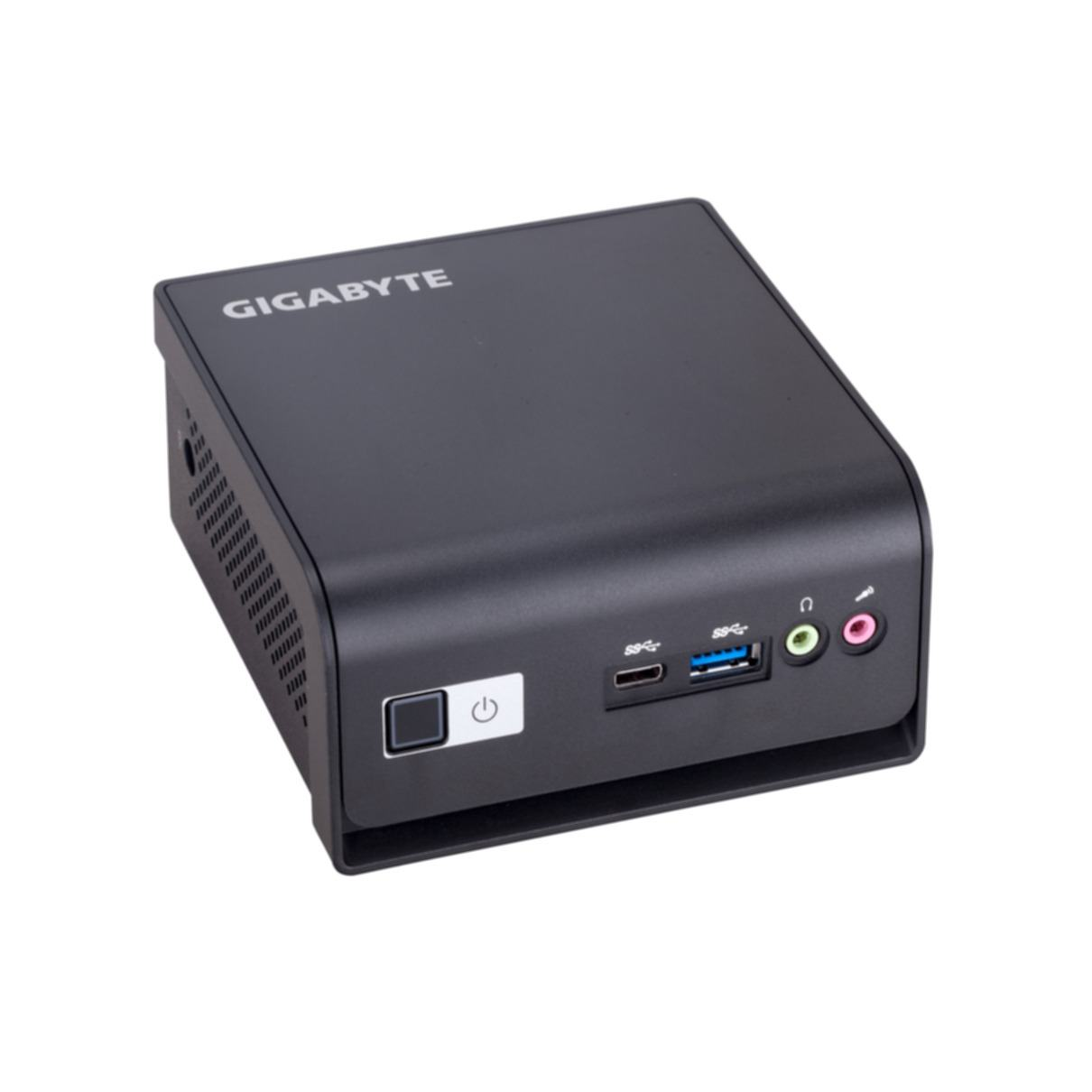 Schwarzer Gigabyte Mini-PC. Hat Anschlüsse an der Vorderseite, darunter USB und Audiobuchsen. Das Logo befindet sich oben.
