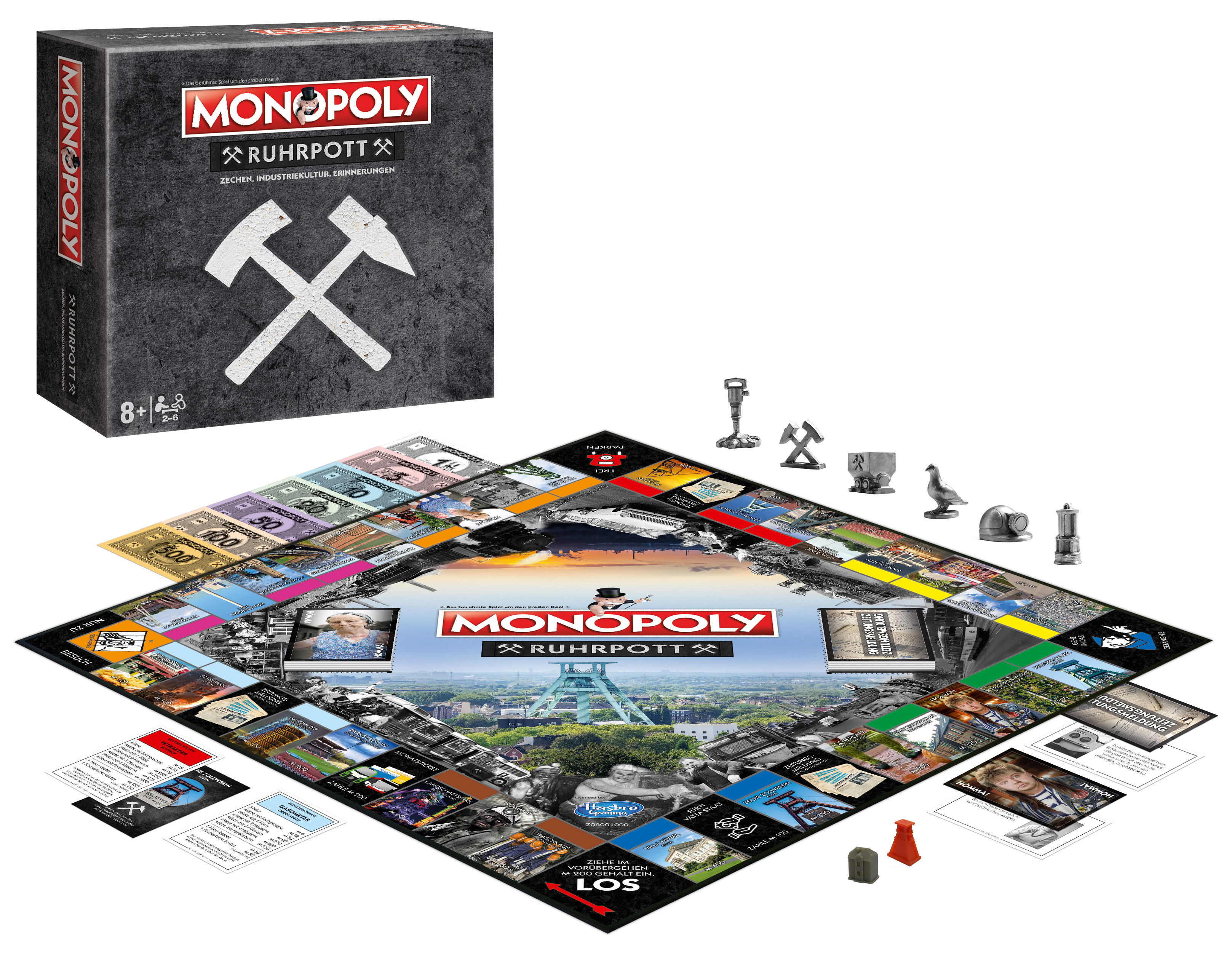 Ein Monopoly-Brettspiel mit Spielsteinen und Karten. Die Schachtel zeigt ein Stadtbild mit dem Ruhrgebiet.