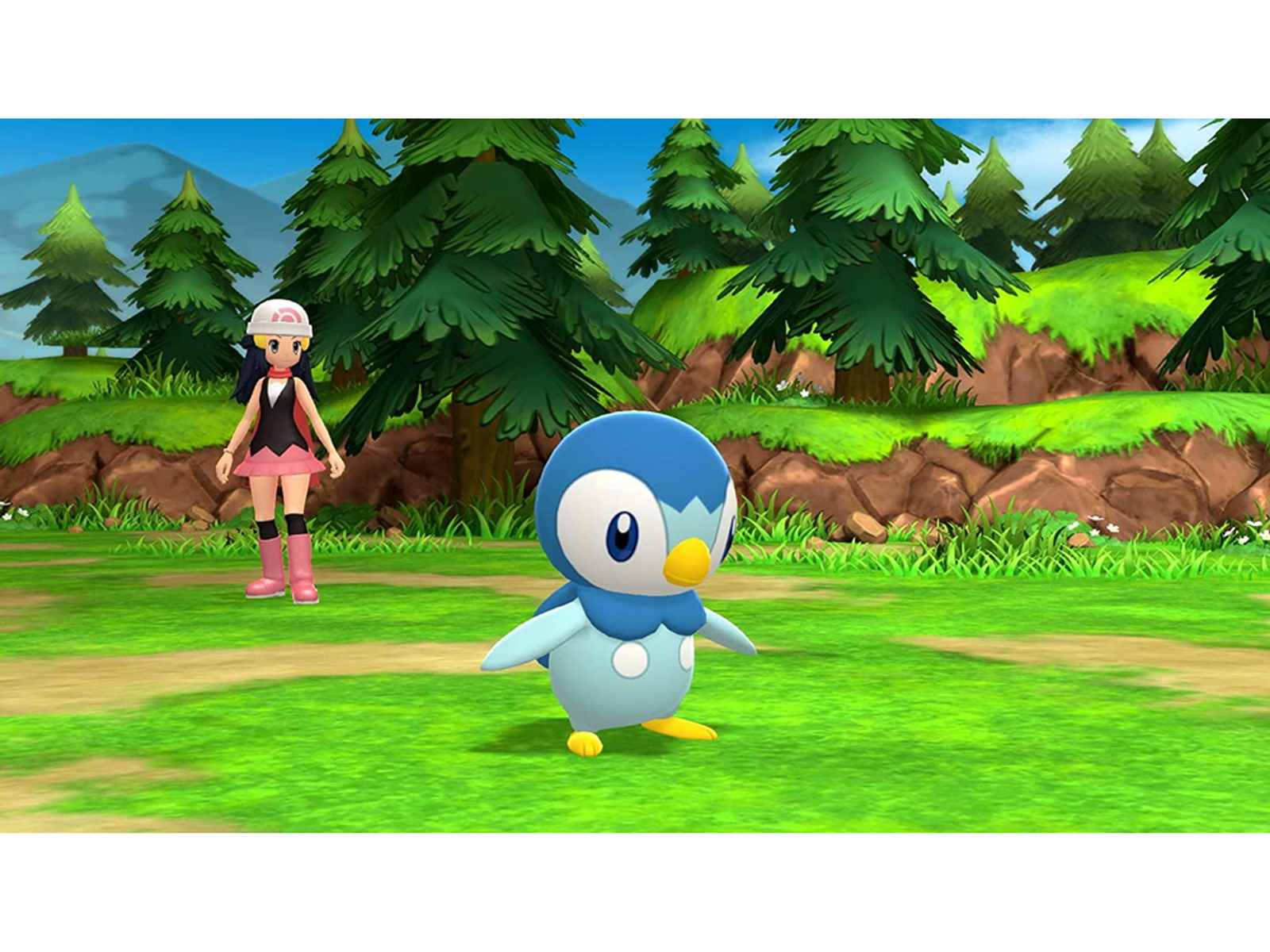 Escena del juego Pokémon. Un entrenador y Piplup en un campo de hierba, montañas detrás.
