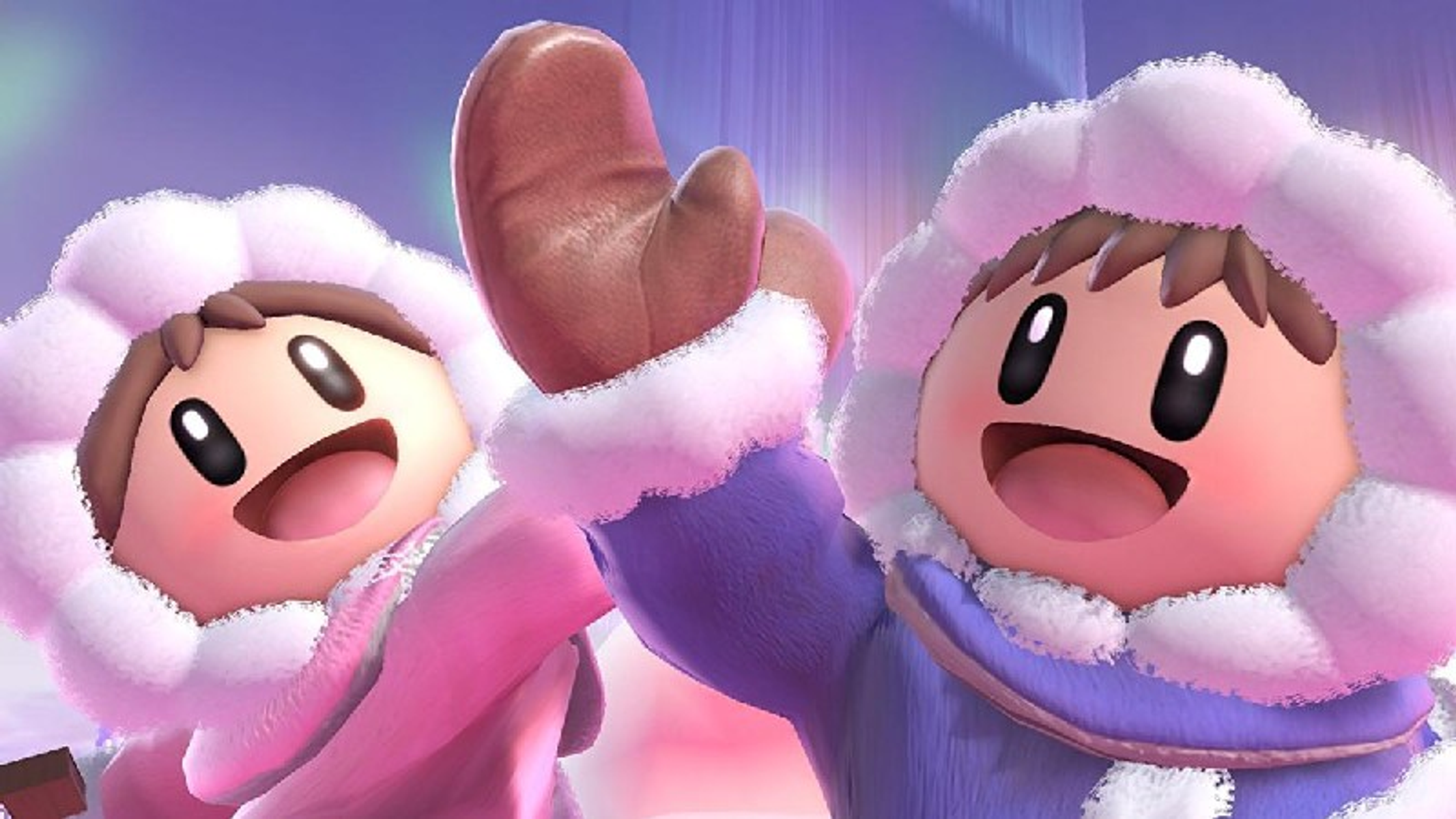 Dwie postaci z kreskówek, Ice Climbers, dają sobie piątkę.