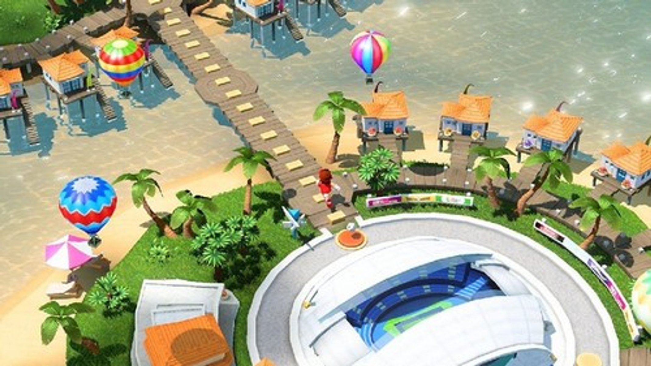 Una colorata vista dall'alto di un livello di gioco sulla spiaggia con edifici.