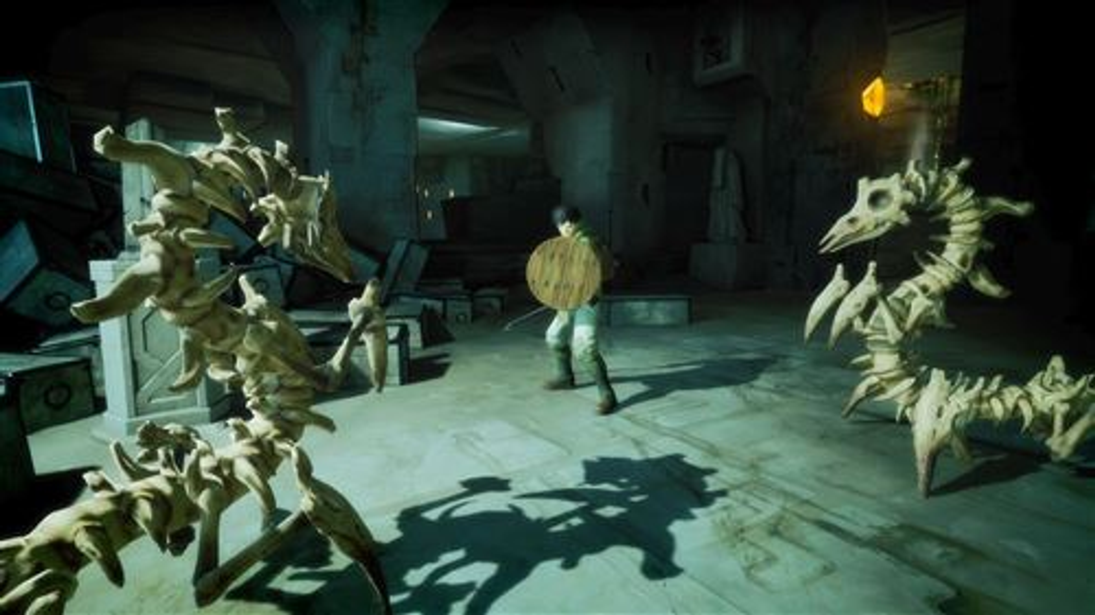 Spielszene: Charakter mit Schild kämpft gegen Skelett-Kreaturen in einem Dungeon.