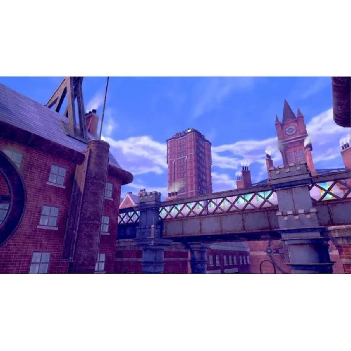 Scena miejska z ceglanymi budynkami, czerwonym budynkiem i czystym błękitnym niebem.