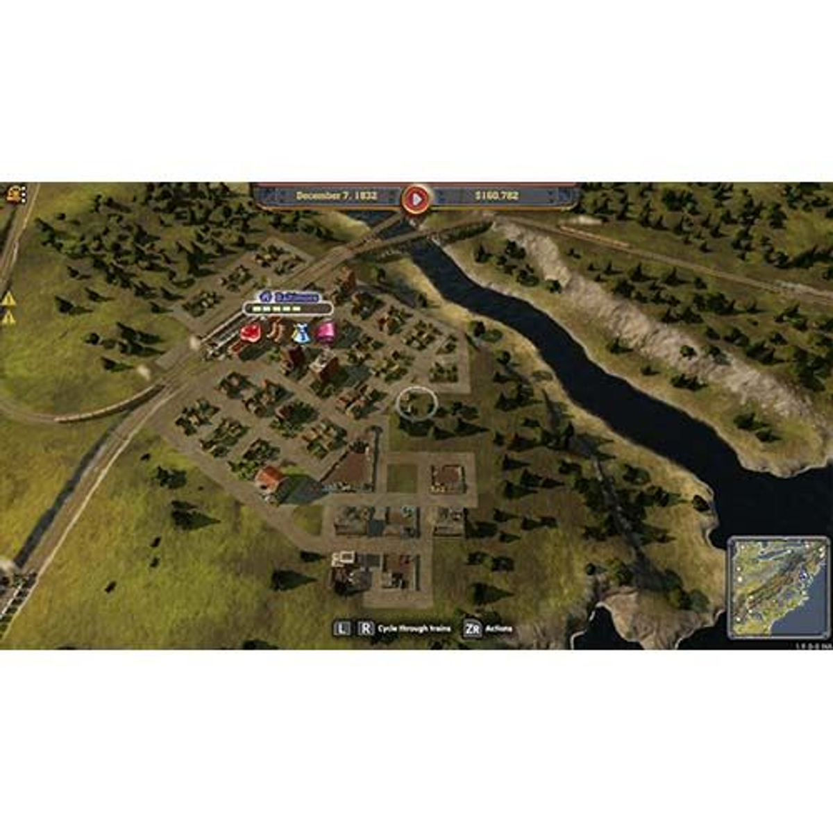 Vista aérea de un mapa de juego, que muestra una ciudad con edificios, carreteras y un río.