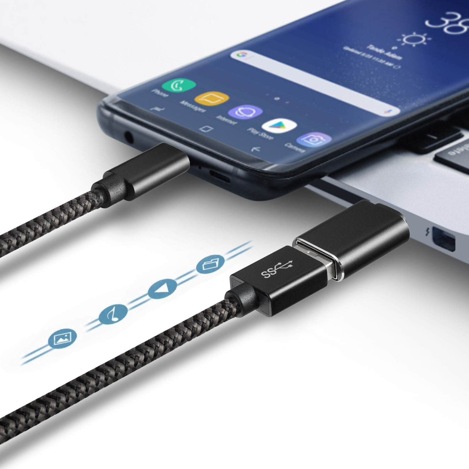 Schwarzes Ladekabel, das mit einem Telefon und einem Laptop verbunden ist.
