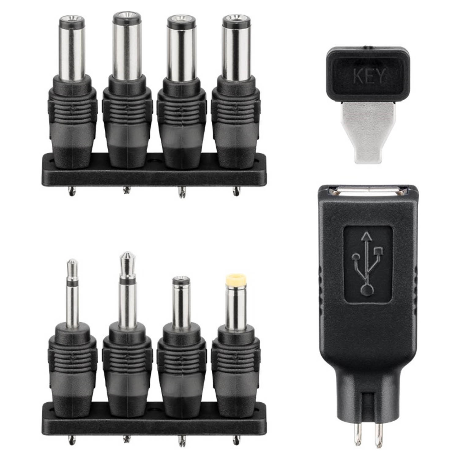 Satz von Netzadaptern mit verschiedenen Spitzen und einem USB-Adapter. Schwarze Farbe.