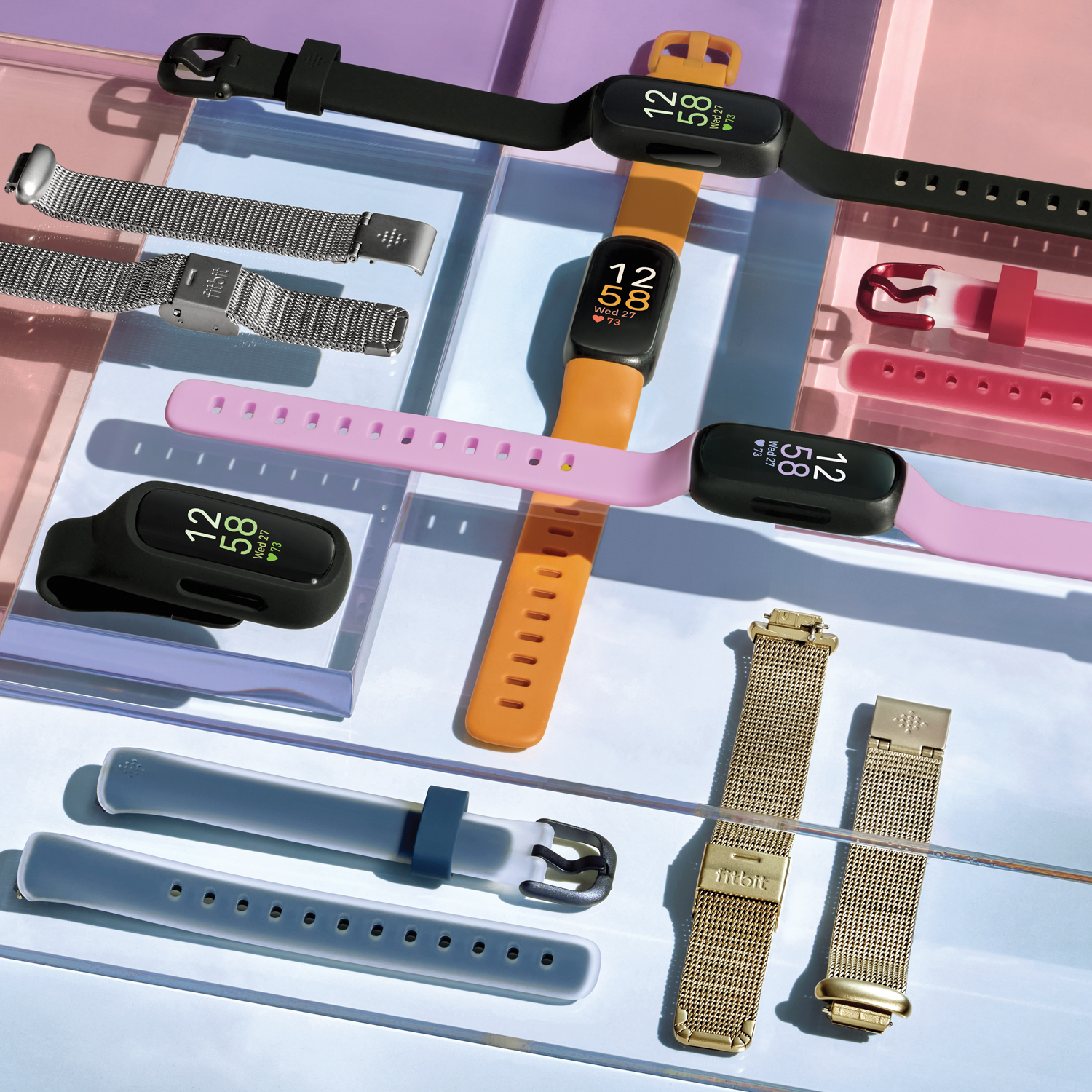 Wiele pasków i tarcz do trackerów fitness, w tym różne kolory i style.