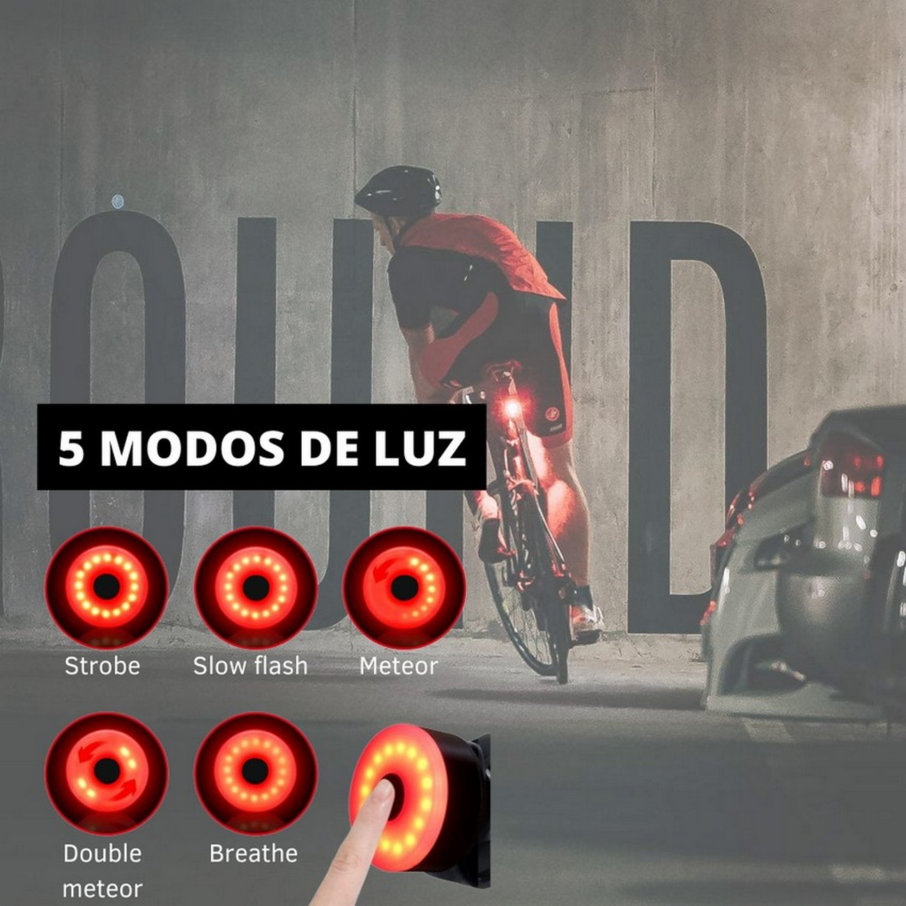 Un ciclista montando una bicicleta con una luz roja que muestra 5 modos de luz en la parte trasera.