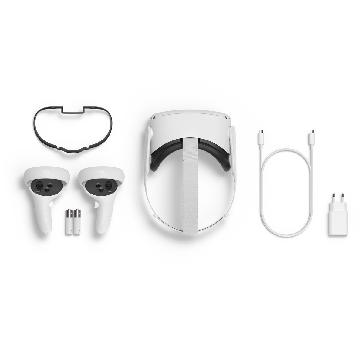 VR-Headset und Zubehör. Enthält zwei Controller, ein Kopfband, Ladekabel und Netzteil.