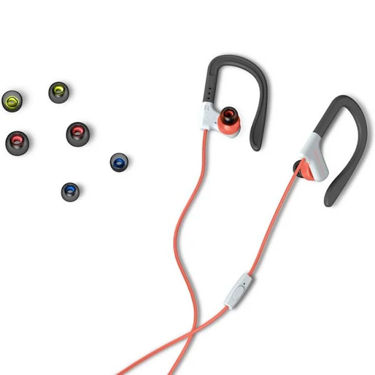 Auricolari con ganci per l'orecchio, dettagli rossi e bianchi e punte di ricambio.