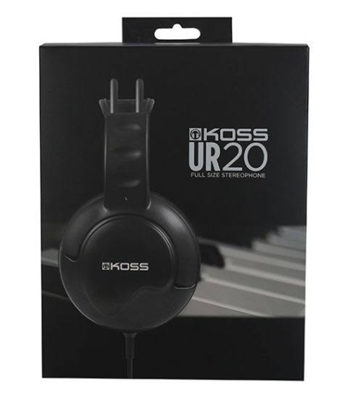 Casque noir et une boîte avec le texte 'KOSS UR20'. Sur une surface blanche.