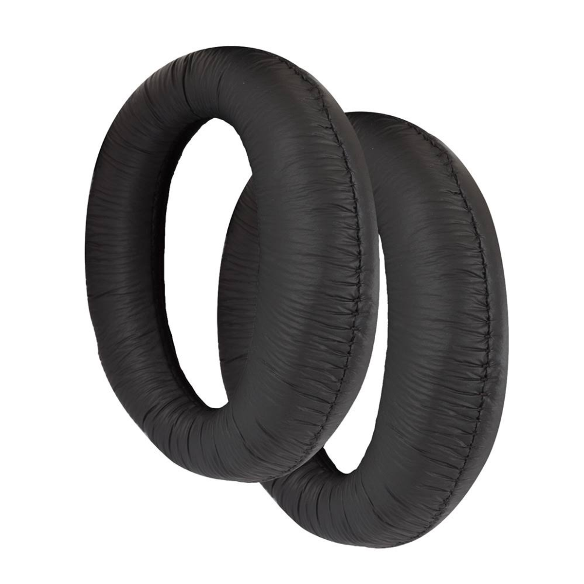 Deux coussinets d'oreille noirs. Les coussinets sont ronds et ont un aspect doux et texturé.