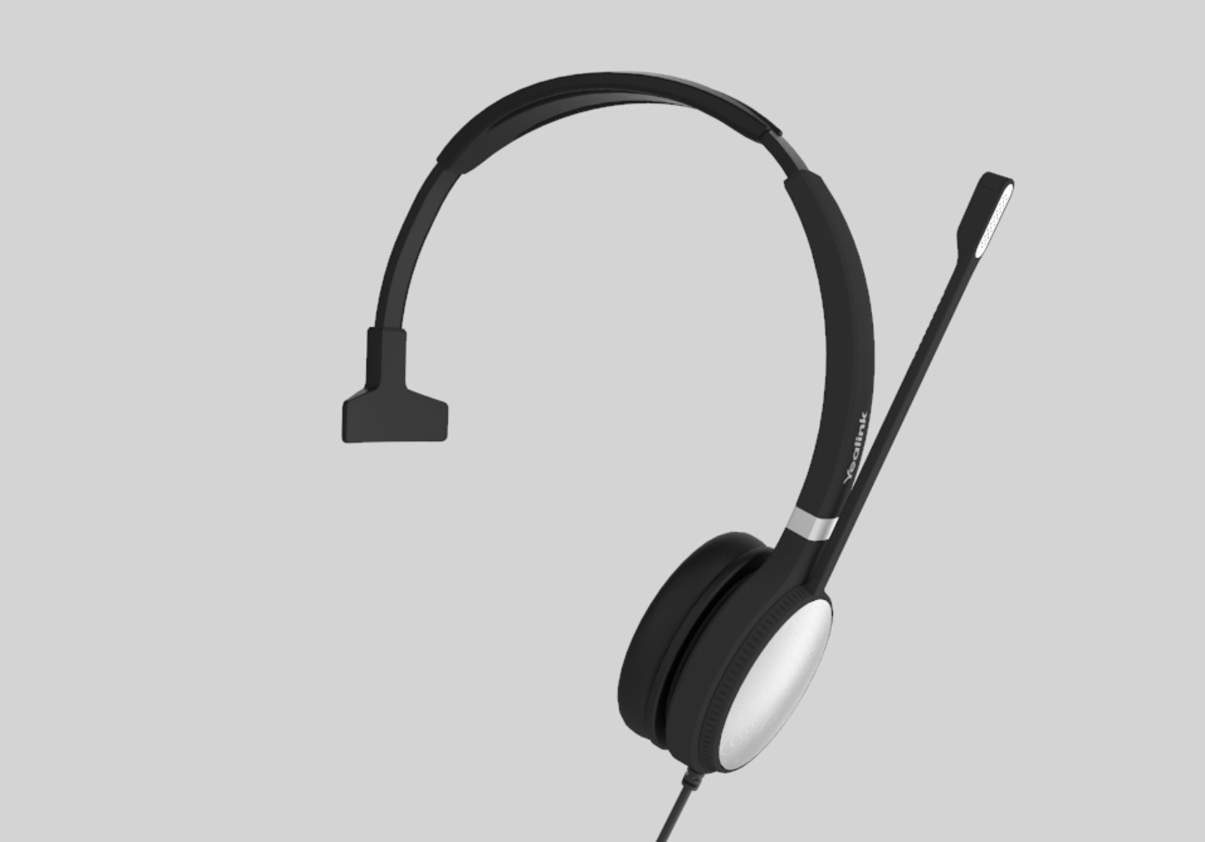 Cuffie nere con un singolo auricolare e un microfono. Ha un design elegante e minimalista.