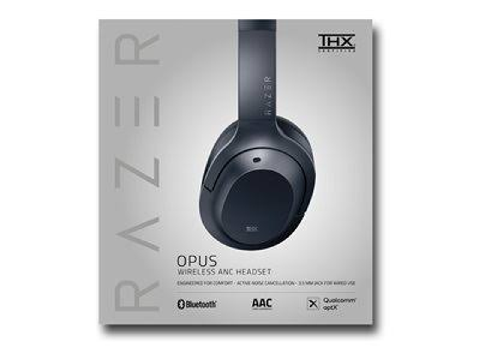 Pudełko słuchawek z marką RAZER. Czarny słuchawki na jasnym tle.