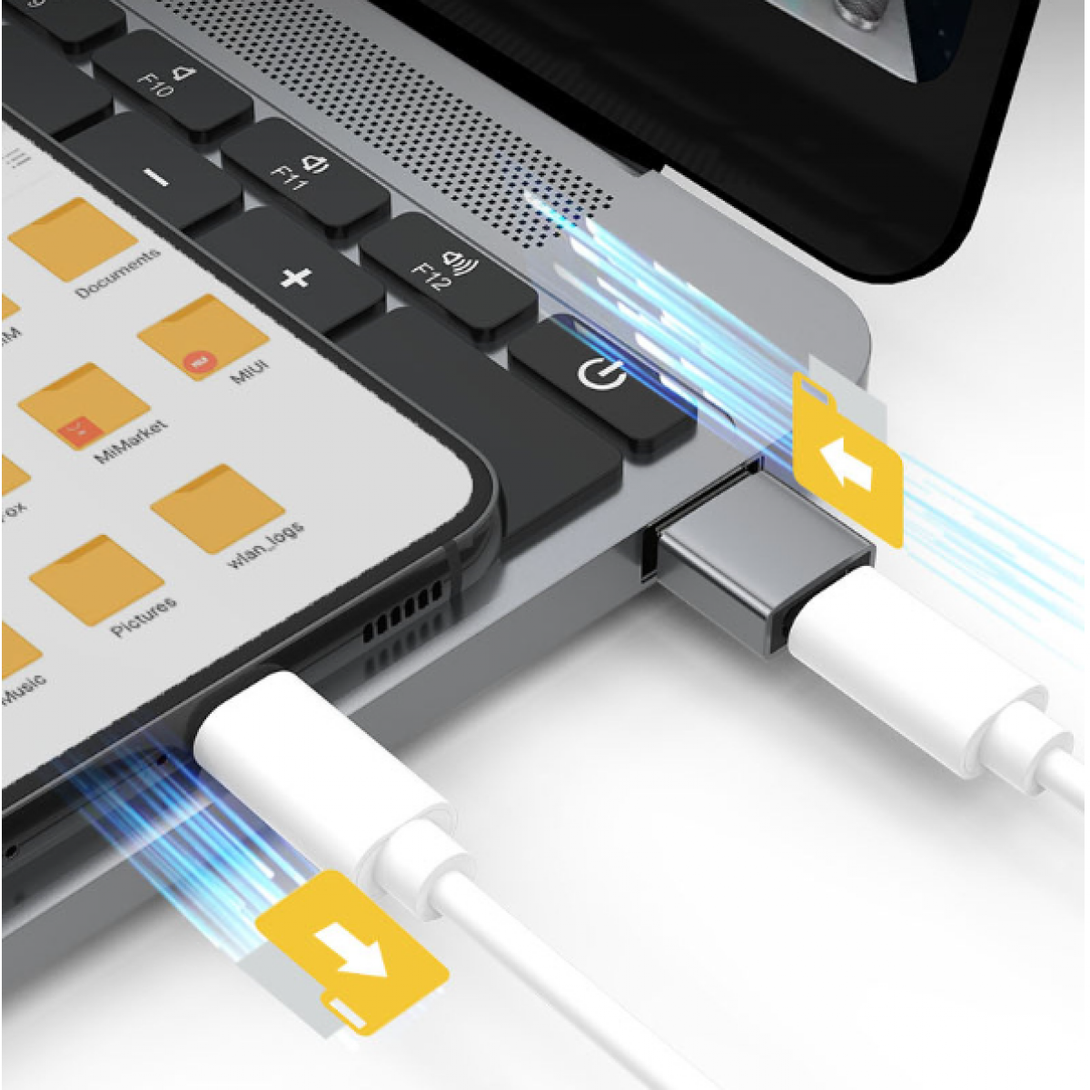 Telefon jest podłączony do laptopa za pomocą adaptera USB-C. Adapter jest w laptopie.