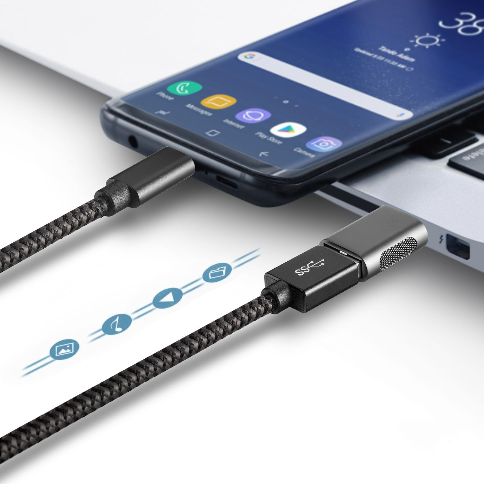 Ein Ladekabel, das mit einem Telefon und einem Laptop verbunden ist. Das Kabel ist schwarz mit silbernen Steckern.