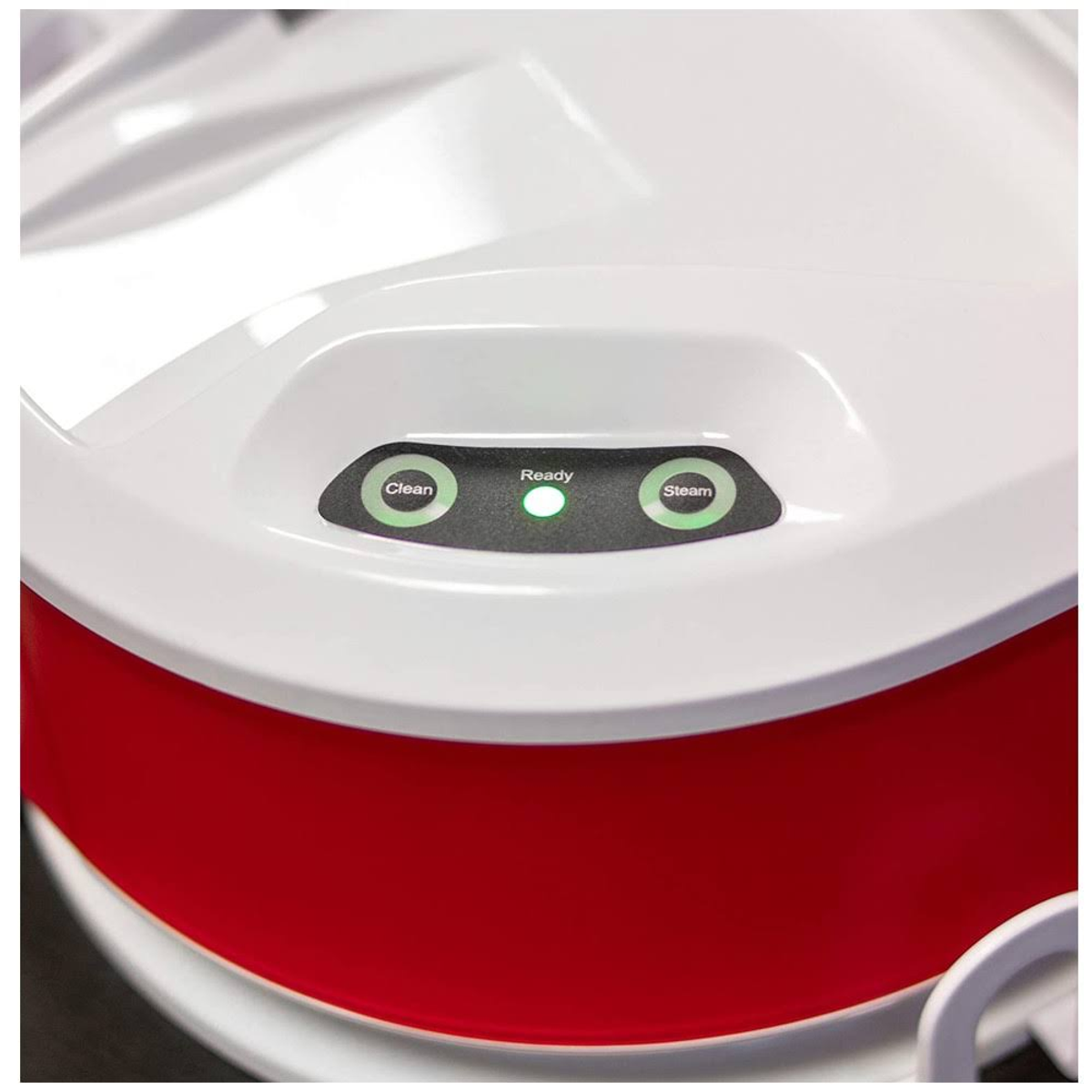 Primer plano de un limpiador a vapor blanco y rojo con tres botones iluminados.