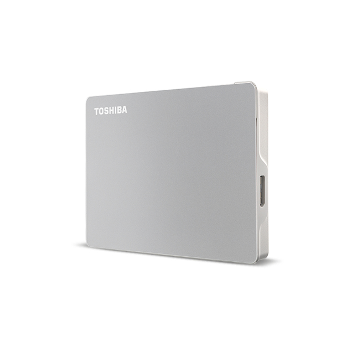 Disco duro externo plateado Toshiba sobre fondo blanco, inclinado a la derecha.