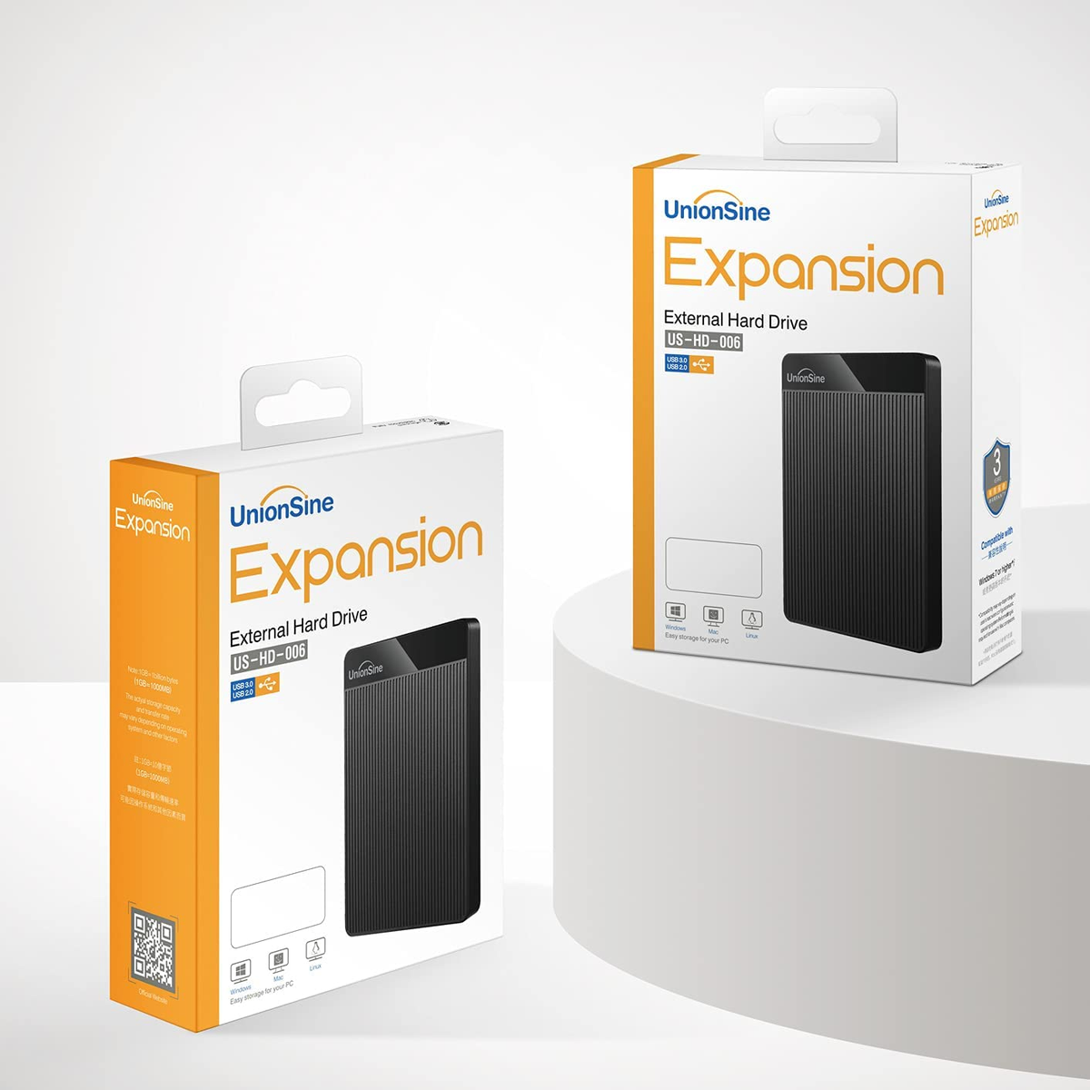 Dos cajas de discos duros externos UnionSine Expansion. Una caja está abierta, mostrando el disco.
