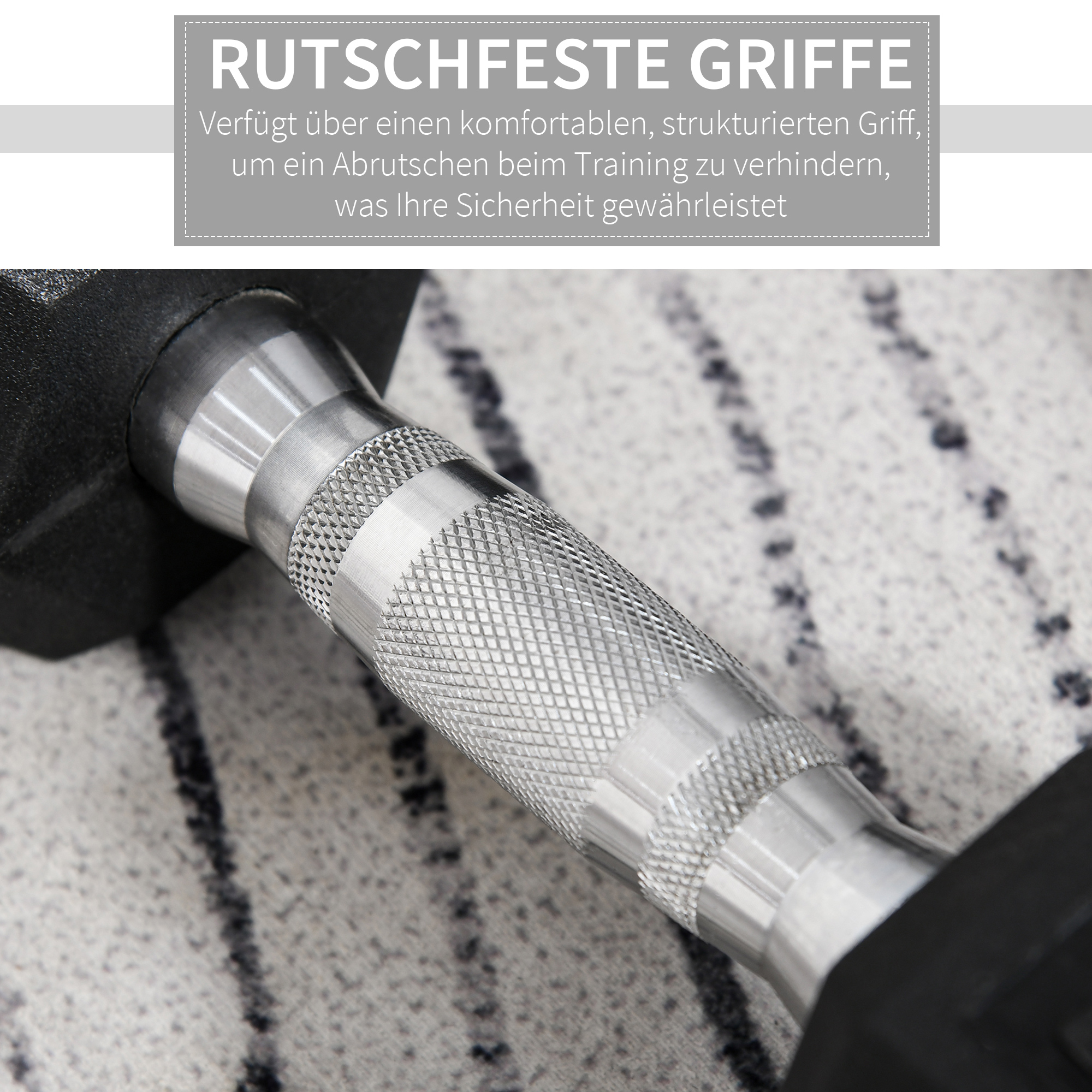 Nahaufnahme eines Metall-Hantelgriffs. Der Griff ist silbern und strukturiert.