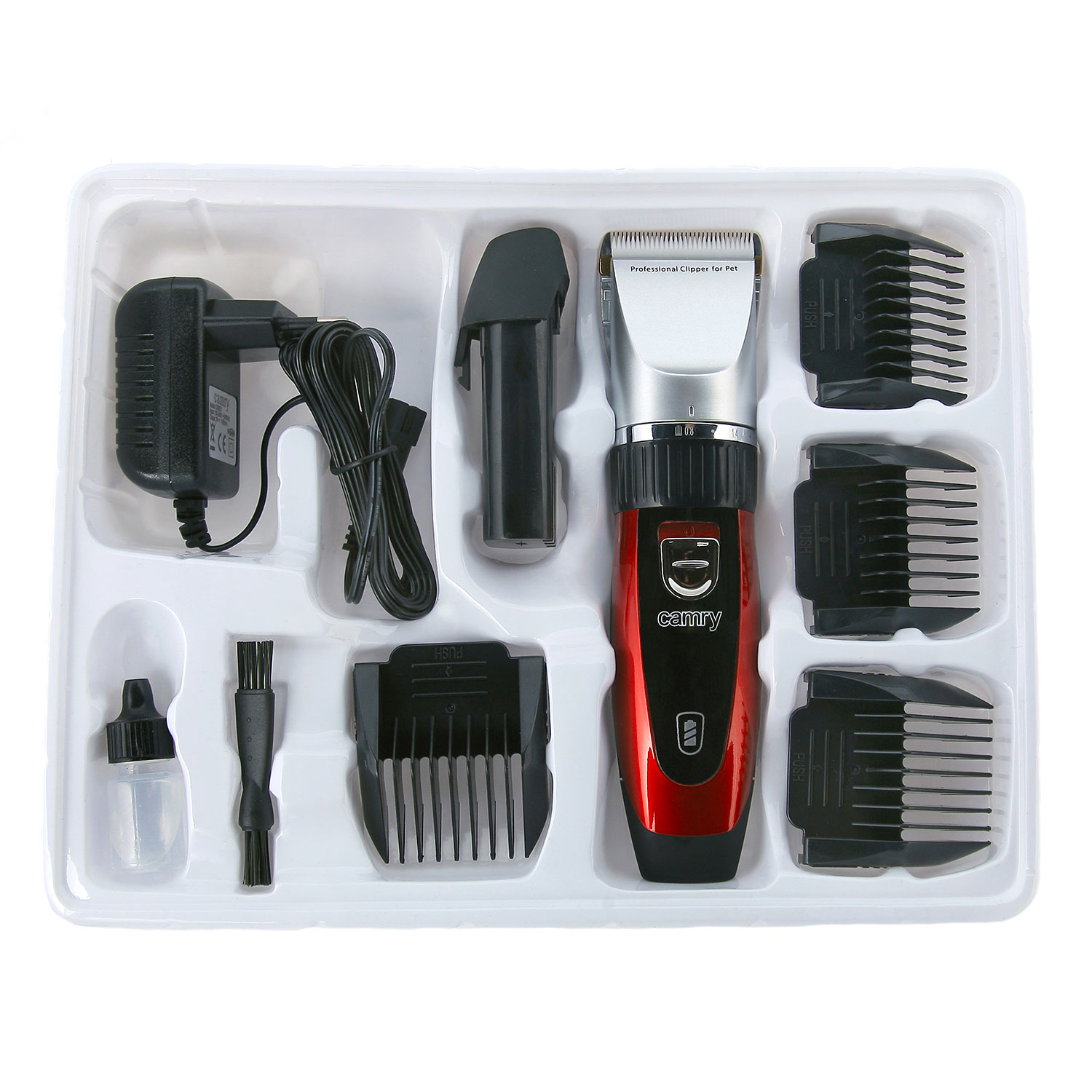 Tierhaarschneidemaschinen-Set mit Zubehör. Enthält Trimmer, Aufsätze, Netzteil und Bürste.