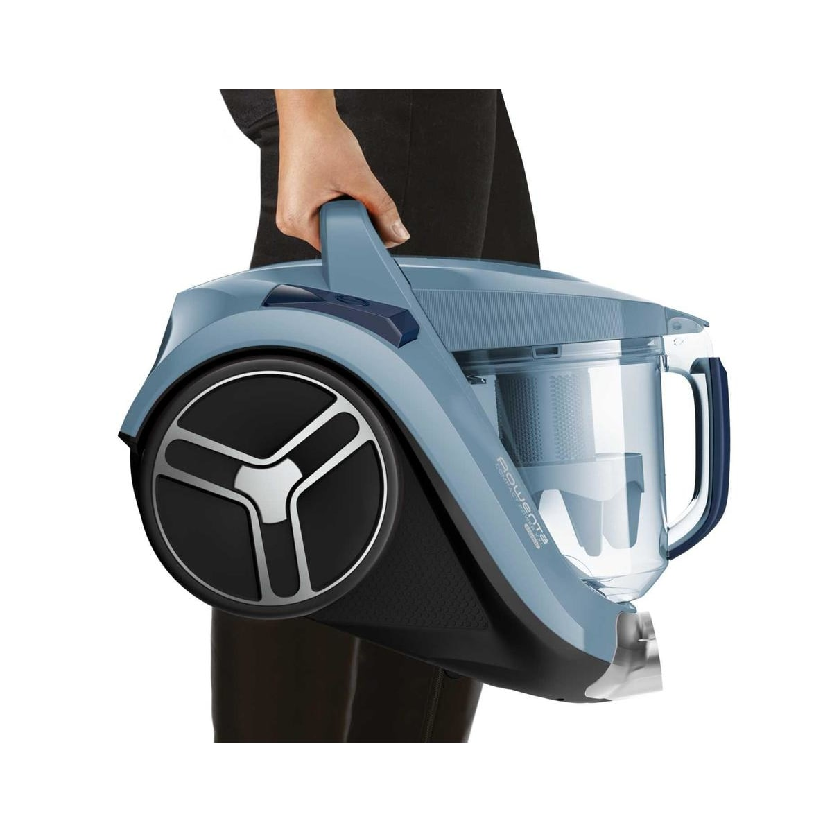 Niebieski odkurzacz. Okrągły kształt, uchwyt, trzymany przez dłoń.