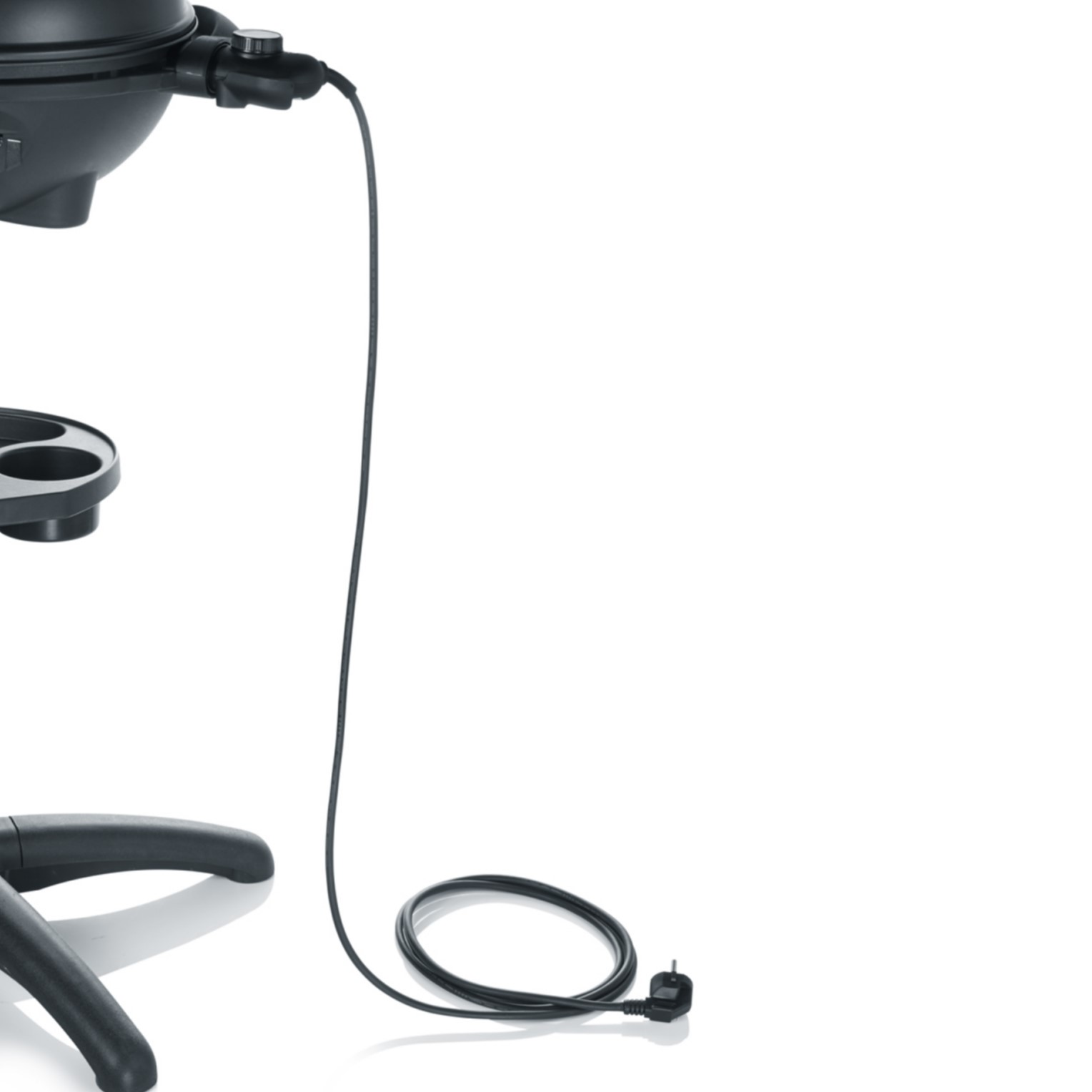 Black grill with black power cord. The cord is plugged in. White background.
