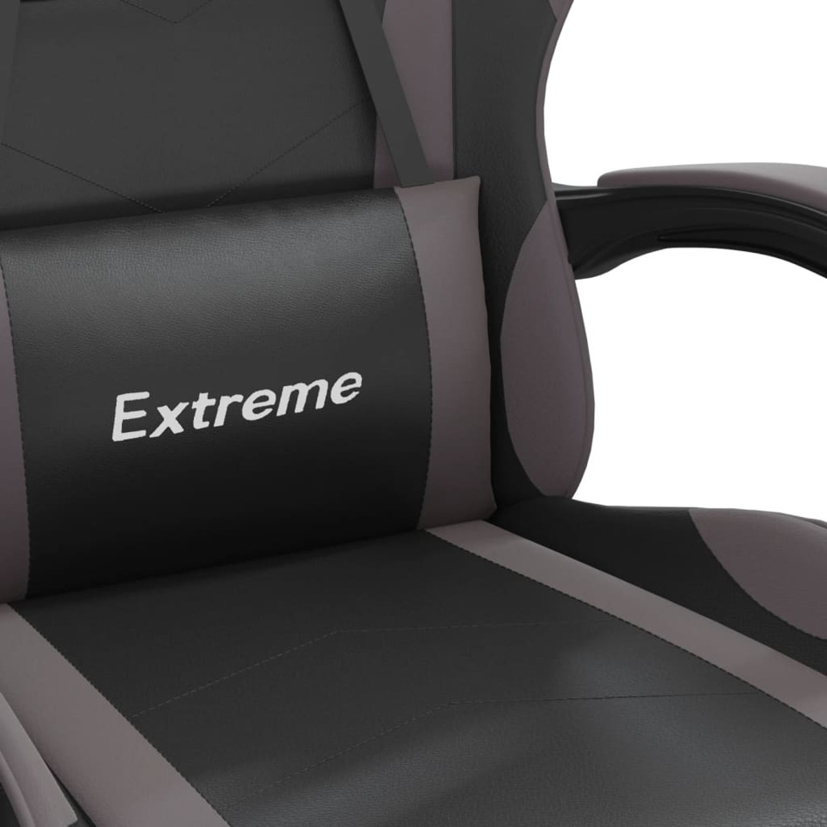 Nahaufnahme einer schwarzen und grauen Gaming-Stuhl-Kopfstütze mit dem Wort 'Extreme'.