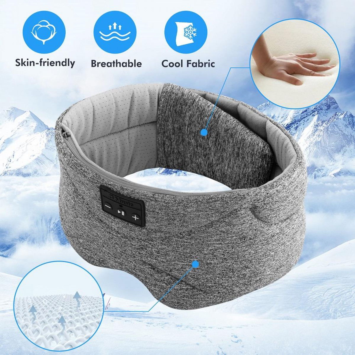 Bandeau avec écouteurs intégrés. Tissu gris. Le bandeau a des boutons et est sur un fond enneigé.