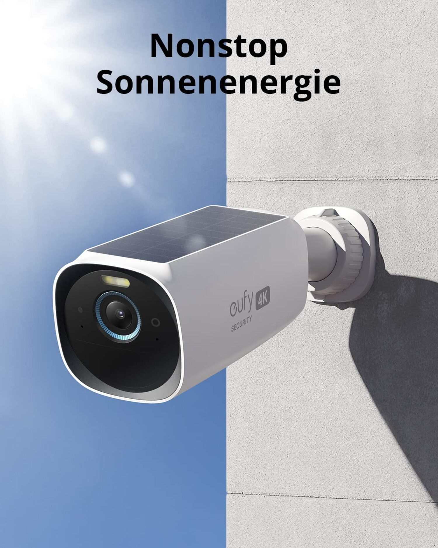 Eine weiße Überwachungskamera mit Solarpanel und dem Text 'Nonstop Sonnenenergie'.