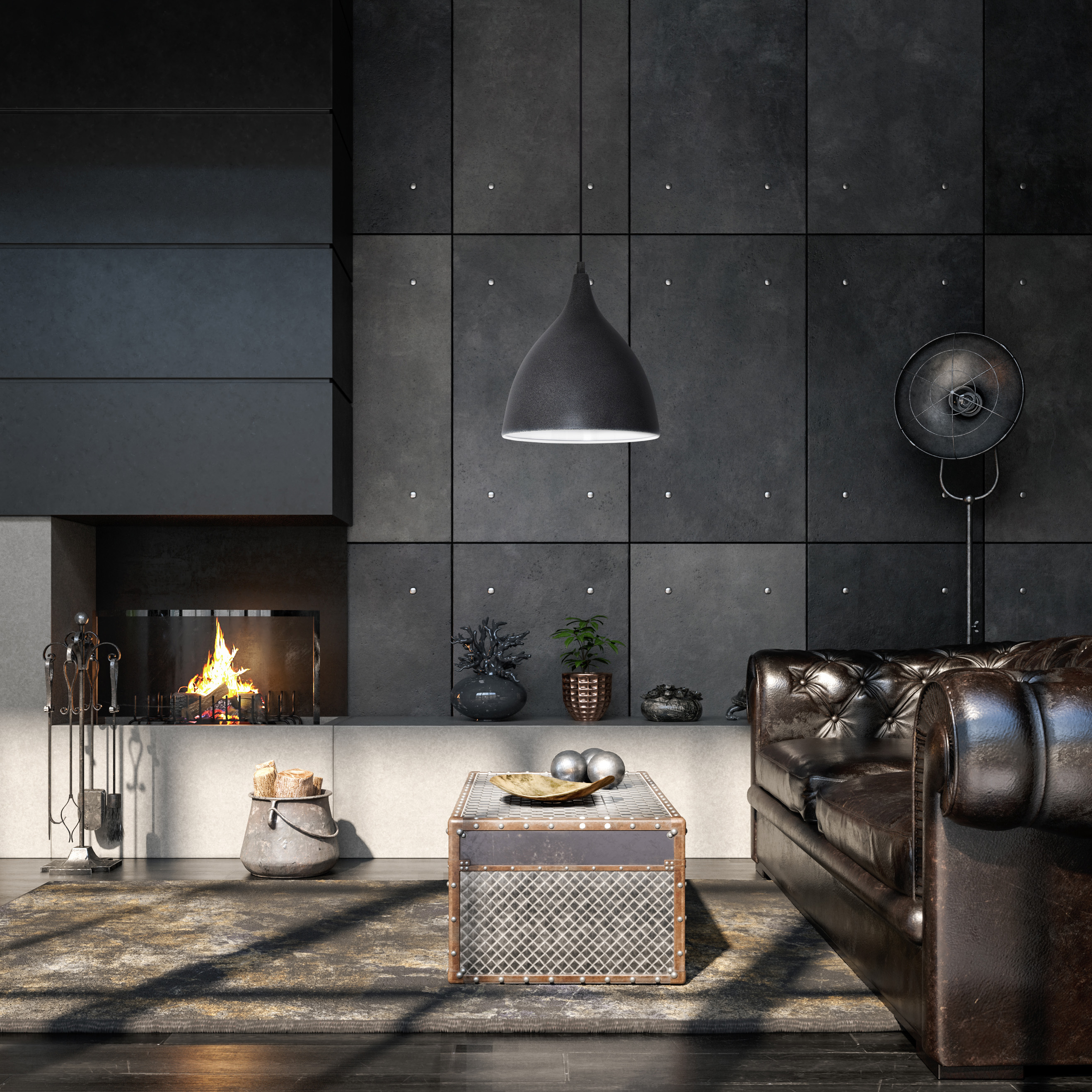 Ein Wohnzimmer mit Kamin, Sofa, Teppich und Pendelleuchte. Der Raum hat dunkle Farben.