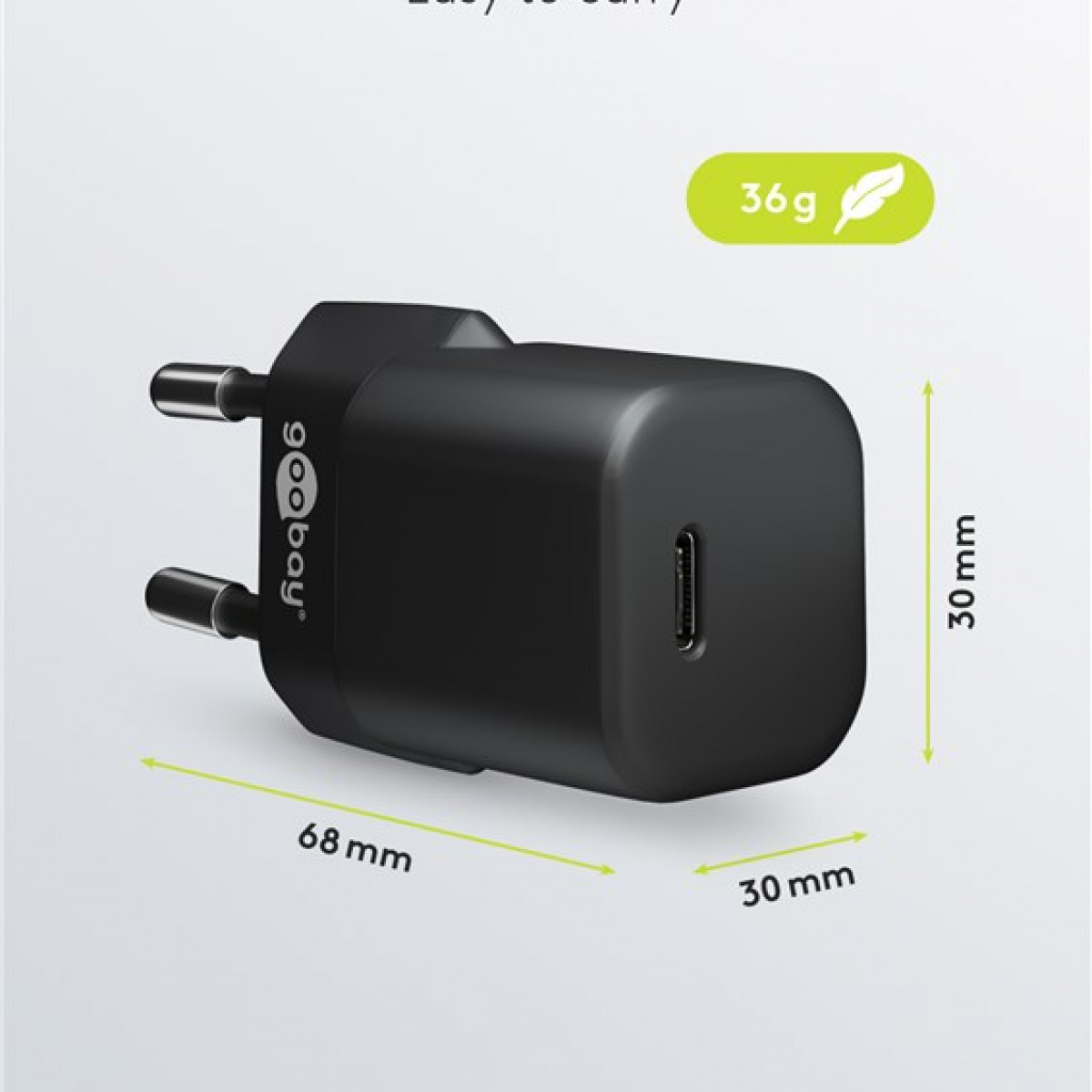 Schwarzes Telefonladegerät mit USB-C-Anschluss. Hat zwei Stifte und ein Etikett mit Abmessungen.