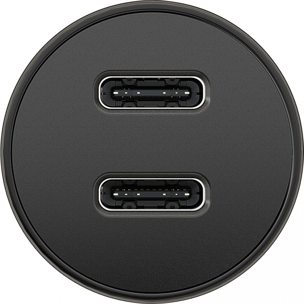 Nahaufnahme eines schwarzen Autoladegeräts mit zwei USB-C-Anschlüssen.