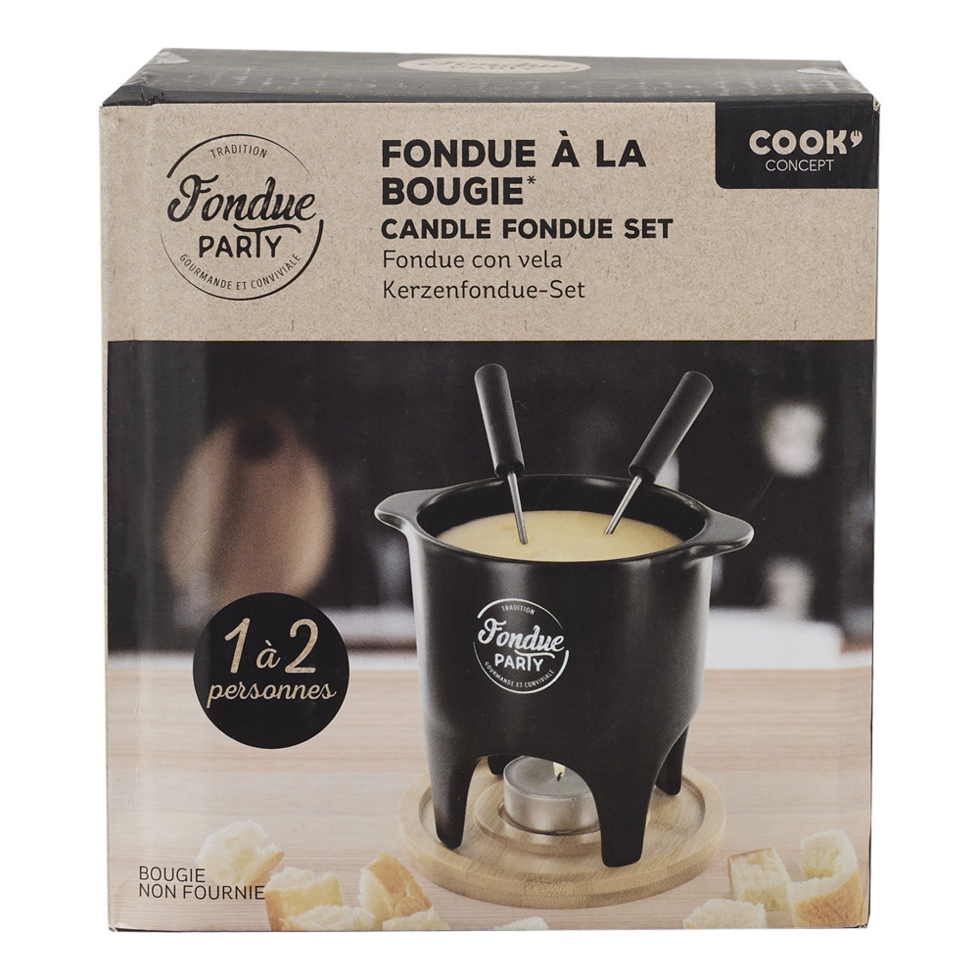 Un set per fonduta con la scatola, include una pentola, forchette e una candela, vista frontale.