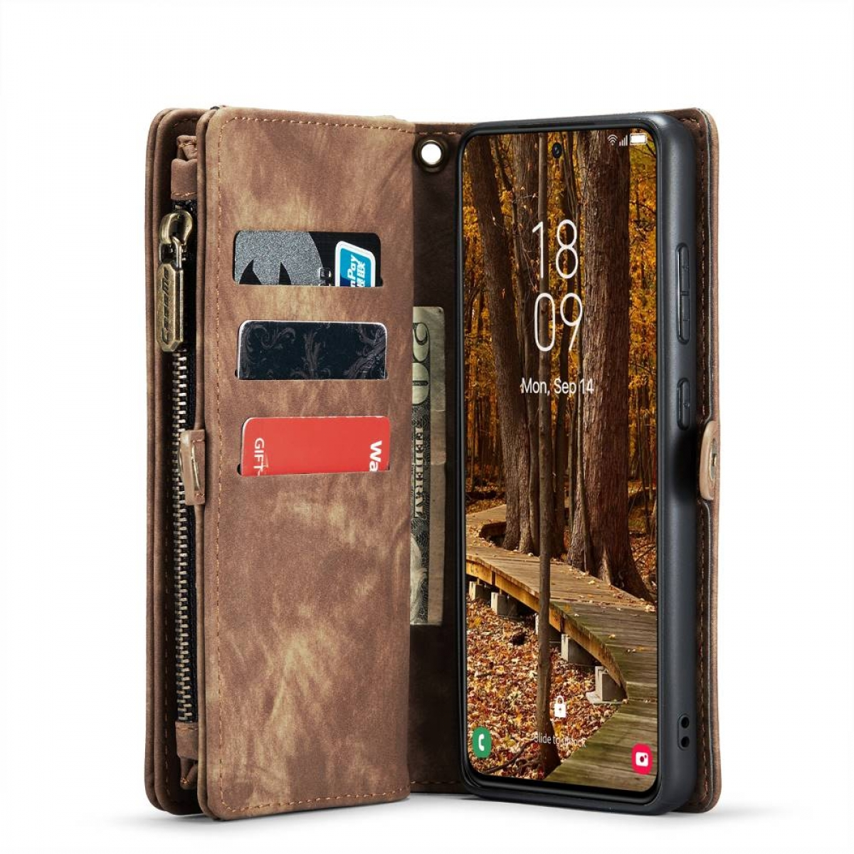 Braune Brieftasche geöffnet, zeigt Karten, Geld und Telefonbildschirm mit Bäumen.