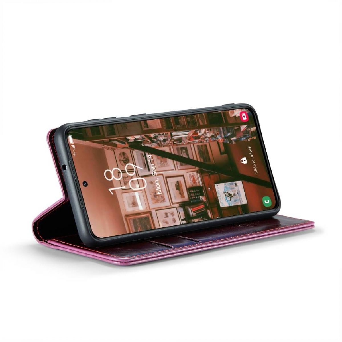 Ein Smartphone in einer rosa Lederhülle, das eine Galerie mit Bildern anzeigt. Das Datum ist der 14. September.