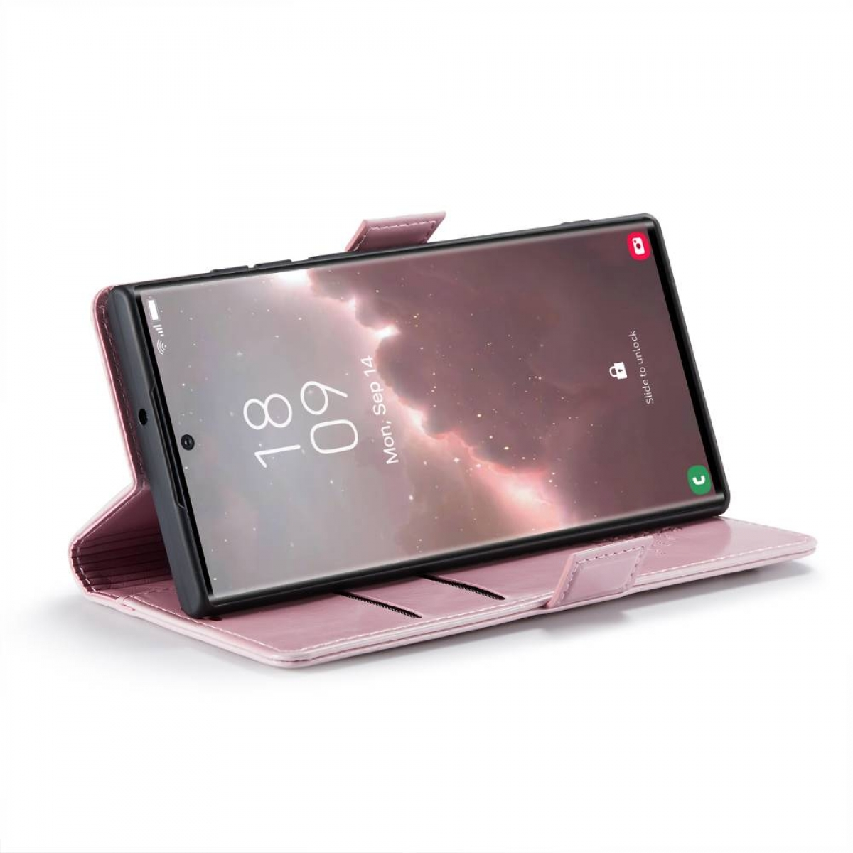 Rosa Handyhülle mit Smartphone, das einen Kalender zeigt. Es ist auf einer weißen Oberfläche geöffnet.