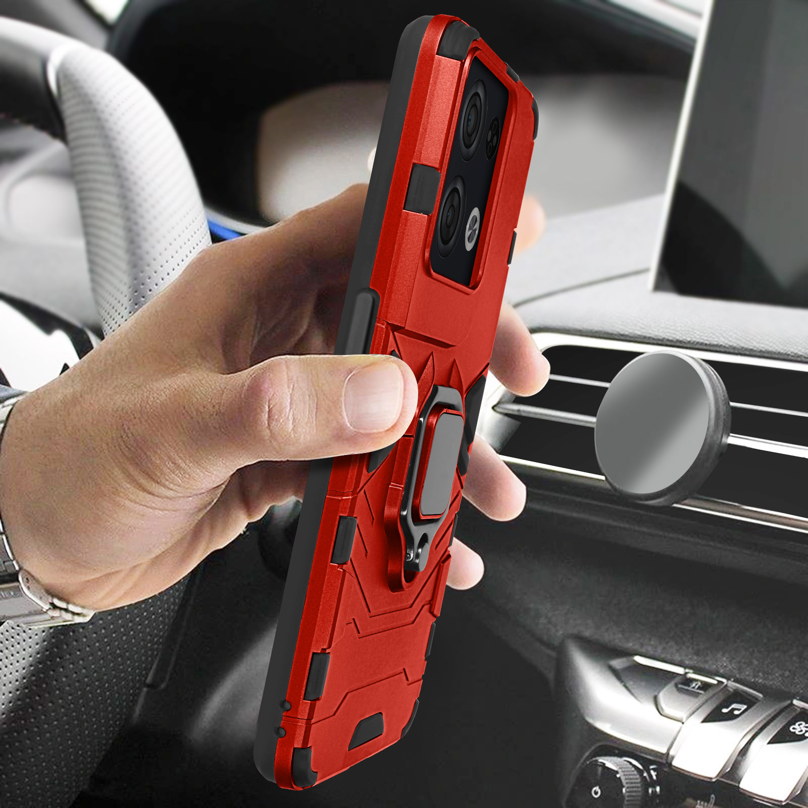 Une coque de téléphone rouge tenue dans une main à l'intérieur d'une voiture. La coque a des détails noirs.